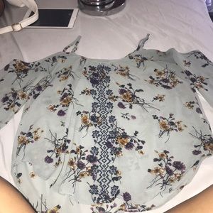 blue and black off the shoulder shirts